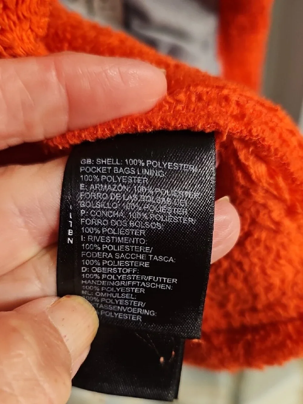 The North Face Girl's Bright Orange Plush Full-Zip Jacket with Purple Accents